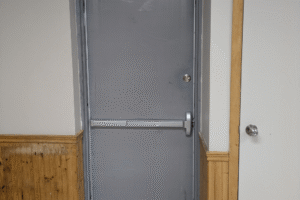 Steel door replacement and signage repair Godfathers pizza in dunville