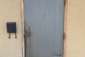 Steel door replacement and signage repair Godfathers pizza in Dunville