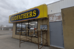 Steel door replacement and signage repair Godfathers pizza in Dunville Steel door replacement and signage repair Godfathers pizza in Dunville